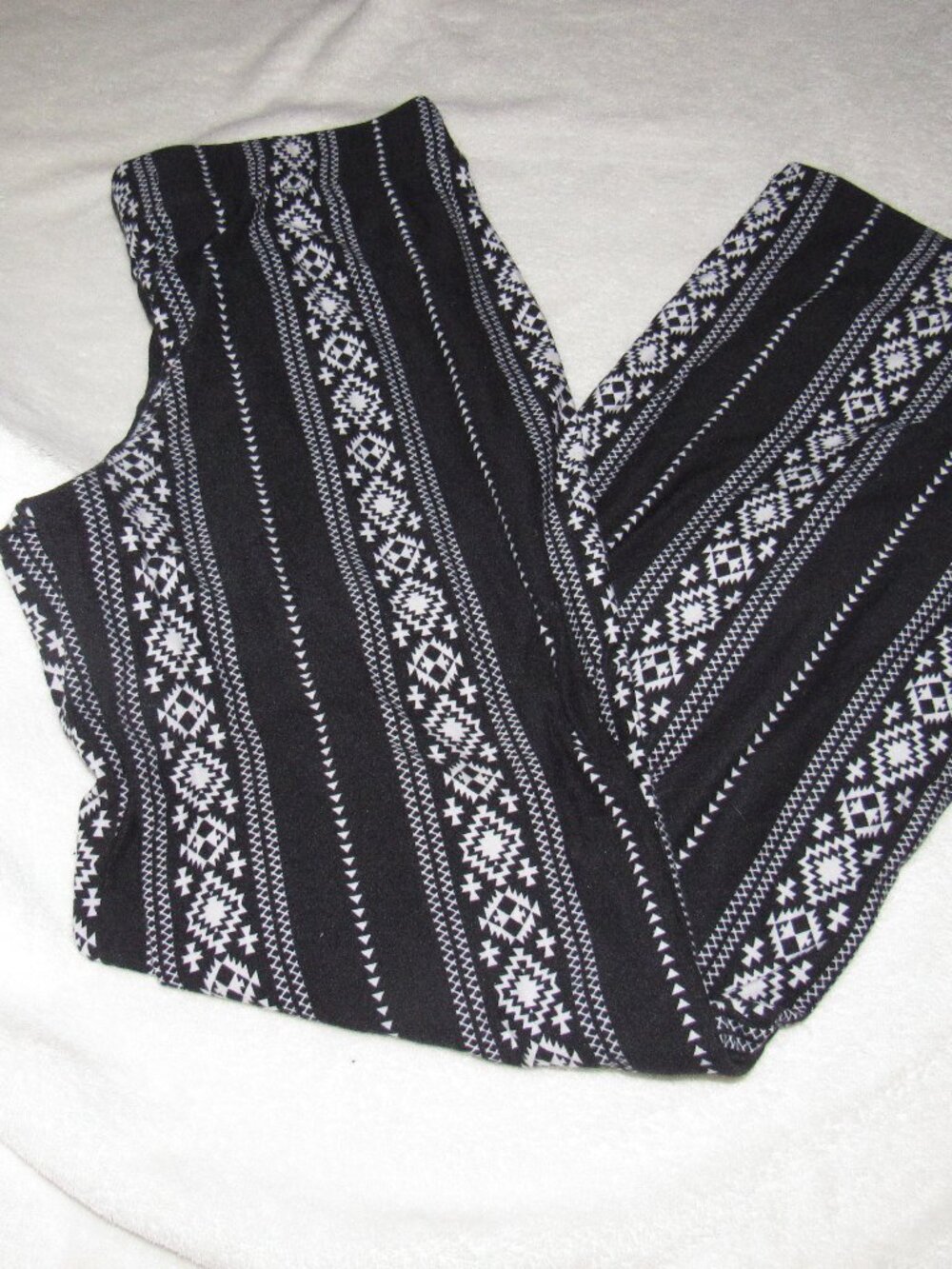 Almost Famous Black/White Boho print flare pants Size Small USED